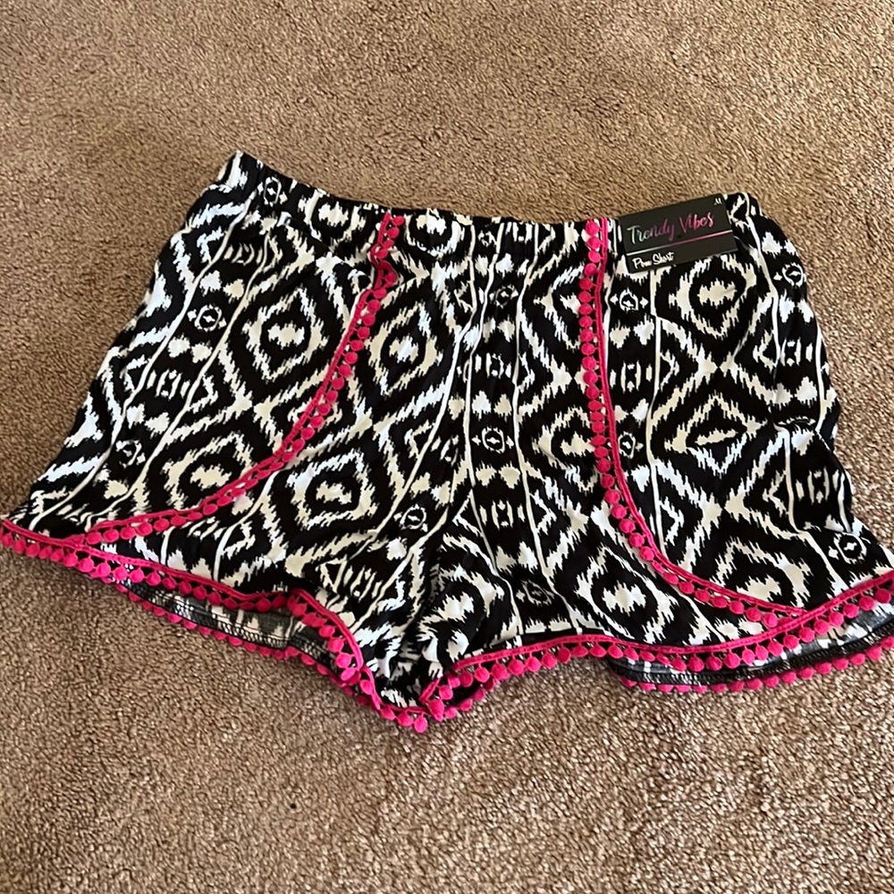 Brand new shorts, great to wear over bathing suit!